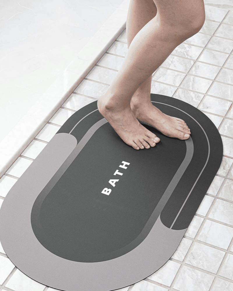 Round_bath_mat_designed_to_support_clutter_free_bathroom_design_with_a_slim_space_saving_profile