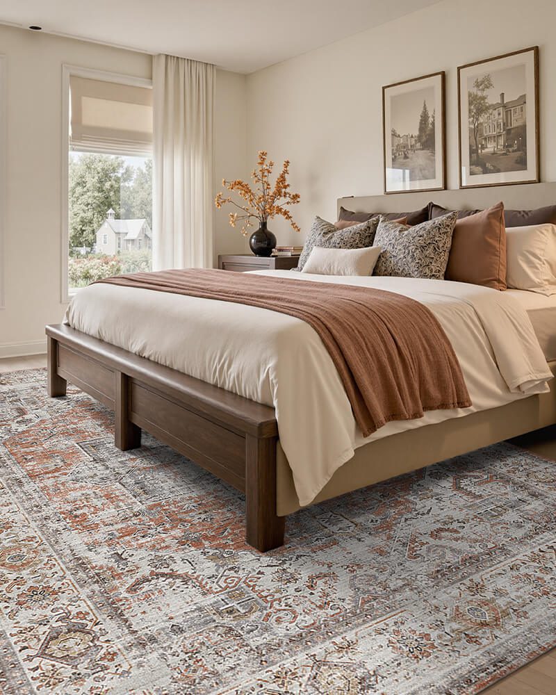 aglaia-washable-area-rug-orange-in-bedroom