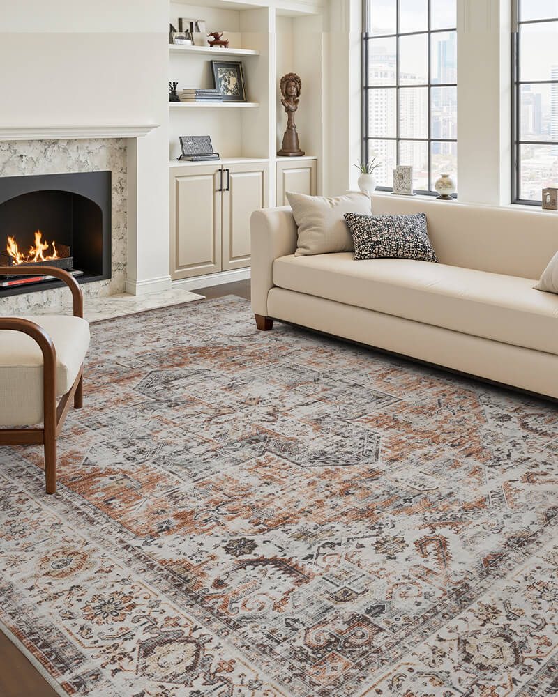 aglaia-washable-area-rug-orange-in-living-room