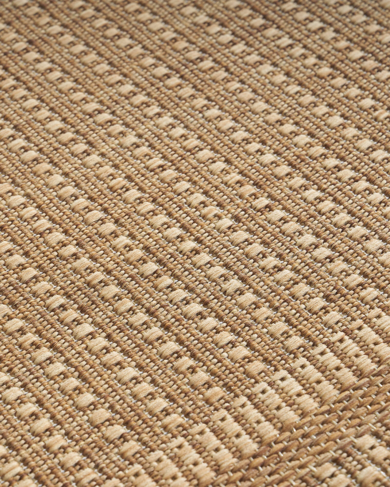 close-up-natural-woven-indoor-outdoor-rug-with-jute-look-texture