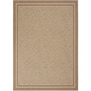 This indoor outdoor rug fits a modern family space with versatile styling and easy-clean durability that works from the patio to the sunroom.