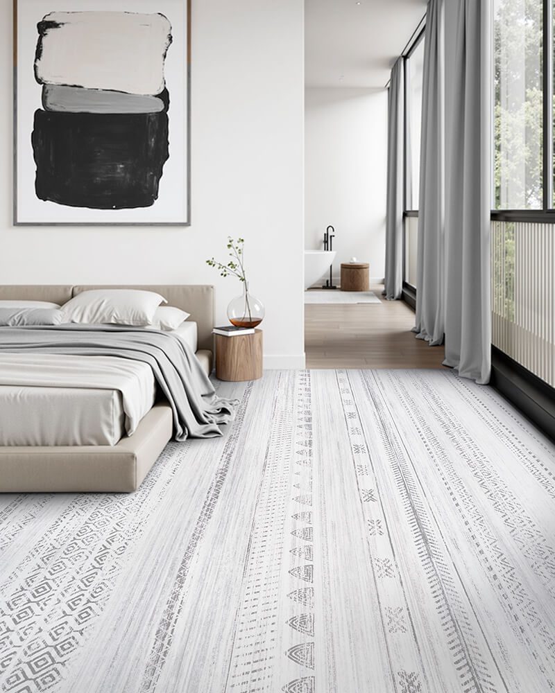 nebula-washable-area-rug-gray-in-bedroom