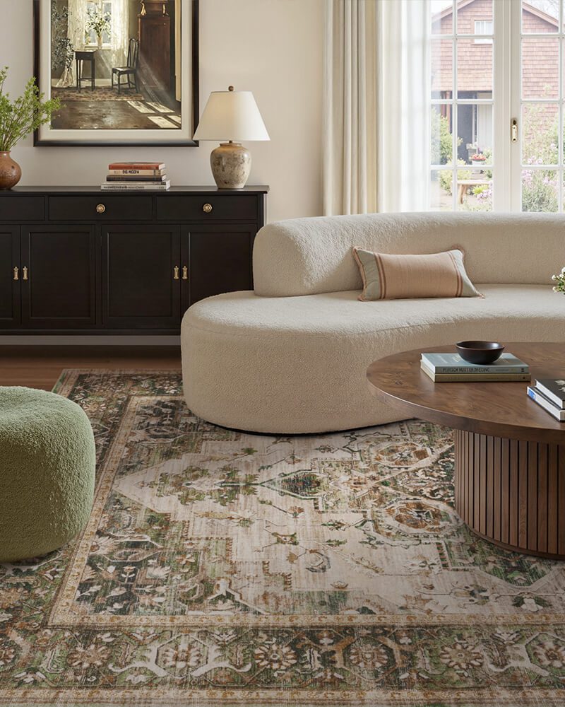 sylva-washable-area-rug-green-in-living-room