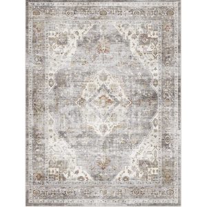This vintage medallion area rug features a softly distressed pattern and washable easy-care design that adds timeless style to everyday home decor.