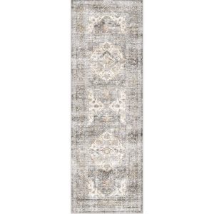 This vintage runner rug features a softly distressed medallion pattern and a washable easy-care design that adds warmth and function to hallways and narrow home spaces.