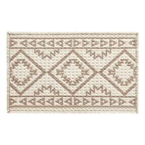 Waffle textured bath mat designed to absorb moisture quickly after showers